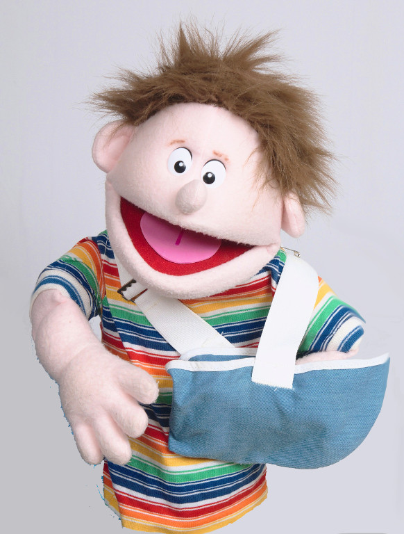 A puppet with an arm in a sling