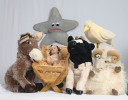 The puppets sitting around the manger