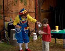 A young boy participates in the show with Rainbow