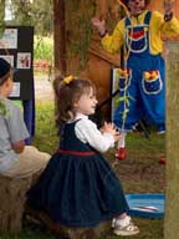 A young girls enjoys the show