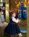 A young girls enjoys the show