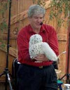 Mr. T holds an owl puppet