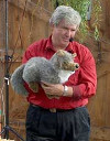 Mr. T holds a wolf puppet