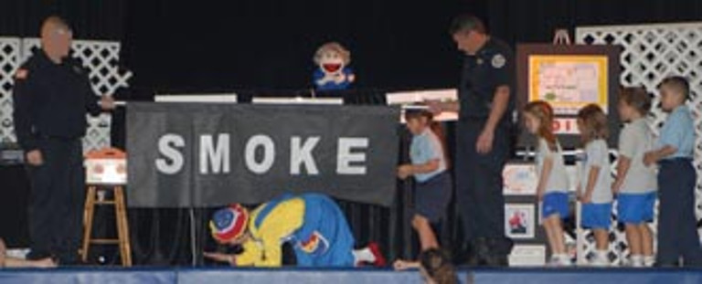 Rainbow demonstrates crawling under smoke